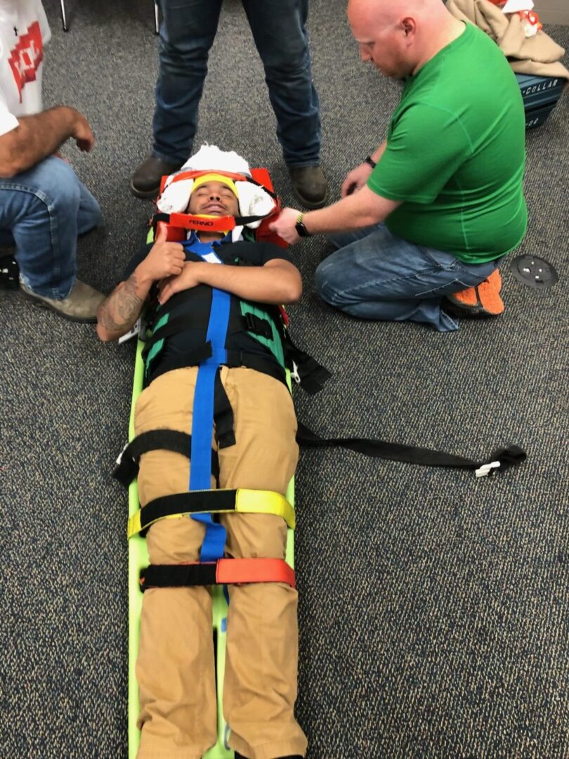 a person on a spinal board